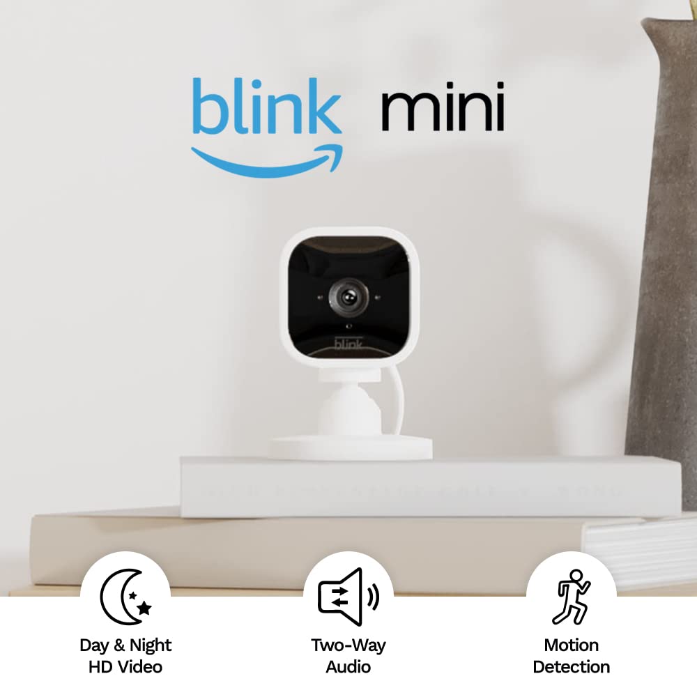 Blink Mini - Compact indoor plug-in smart security camera, 1080p HD video, night vision, motion detection, two-way audio, easy set up, Works with Alexa – 2 cameras (White)