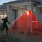 RUOCIN Solar Security Alarm Light with 129dB Gunshot & Dog Barking Sound